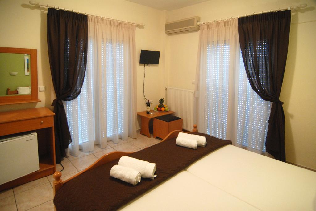 Apollon Hotel Paralía Pokoj fotografie